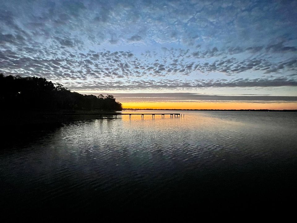 Standing on our dock. First sunrise in December. Beautiful morning.