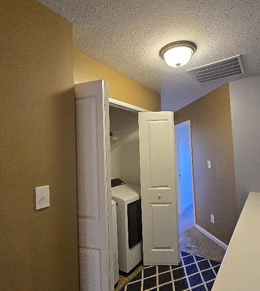 The laundry is located on the same floor, making cleaning easy and convenient.
