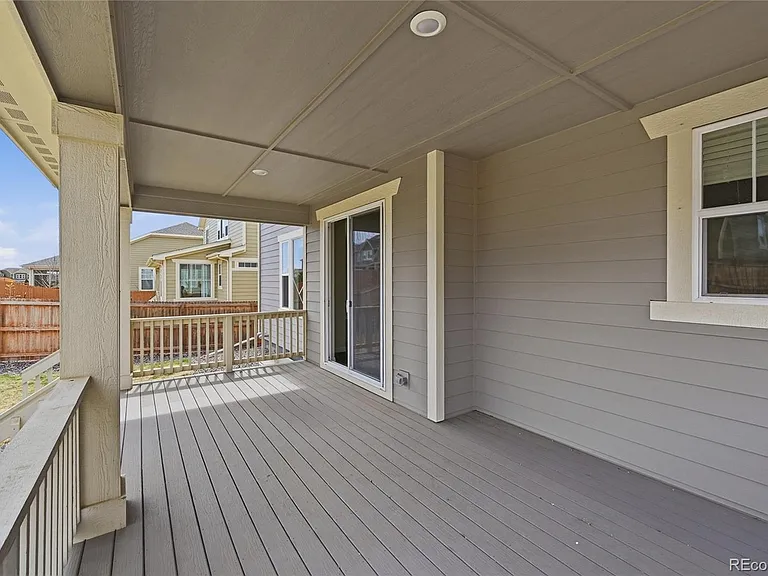 covered deck in the backyard