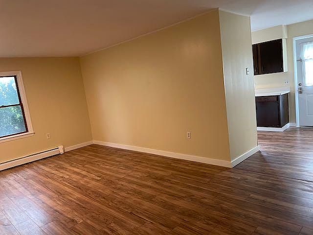 Living room; part of kitchen and entry