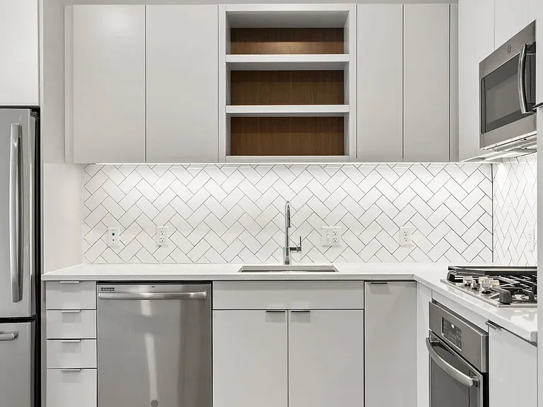 Kitchen with Stainless Steel Appliances and Granite Countertops