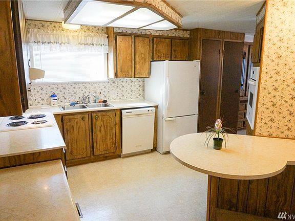 A lot of countertop space and cabinets.  The informal dining or work area is handy.