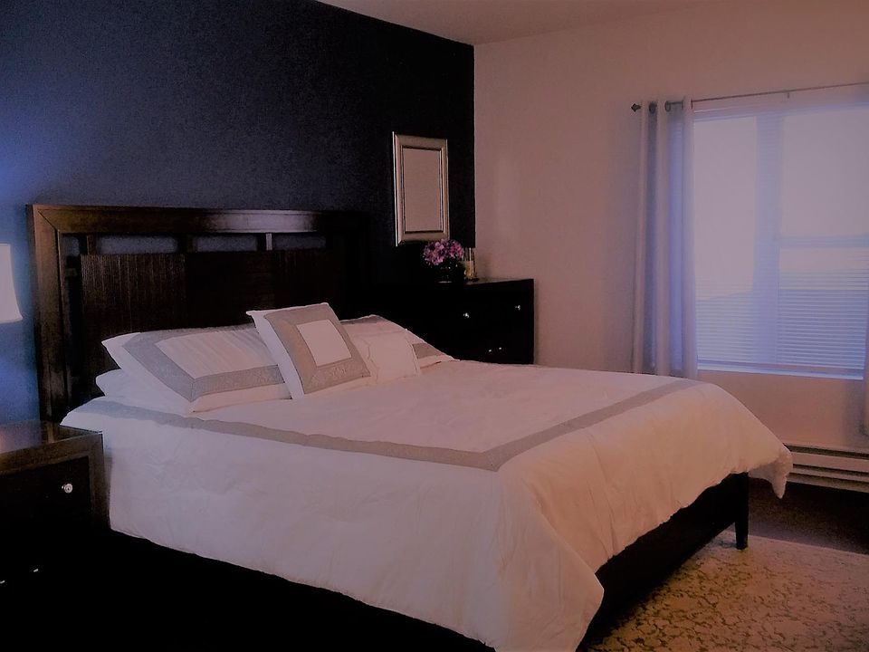 Master Bedroom with king size bedroom set; desk and chair