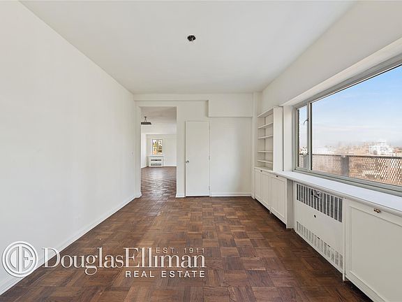 2nd image of 166 E 63rd St Penthouse A
