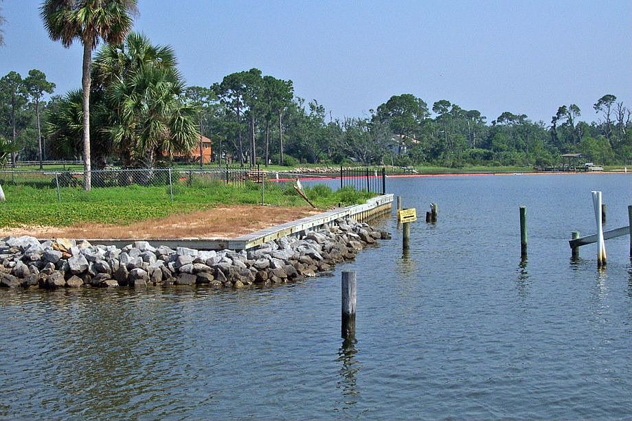 Lot view with sea-wall