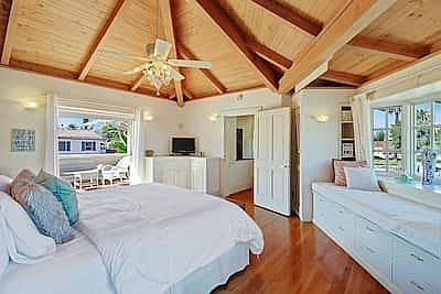 Master suite boasts vaulted ceilings and privacy