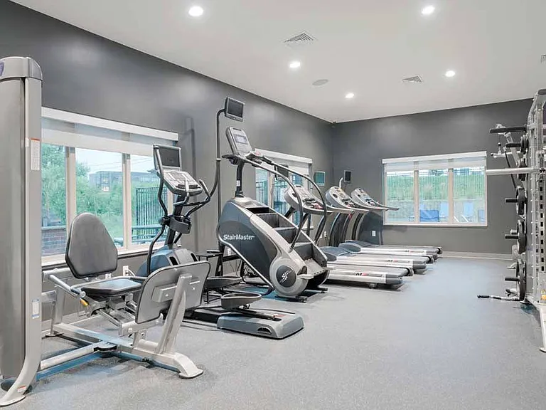 Bright, well-equipped workout areas support everything from daily training sessions to weekend wellness goals.