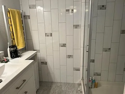 Custom tile and accents run the full length of the wall