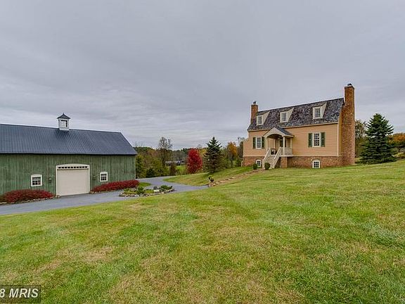 Home adjacent to barn