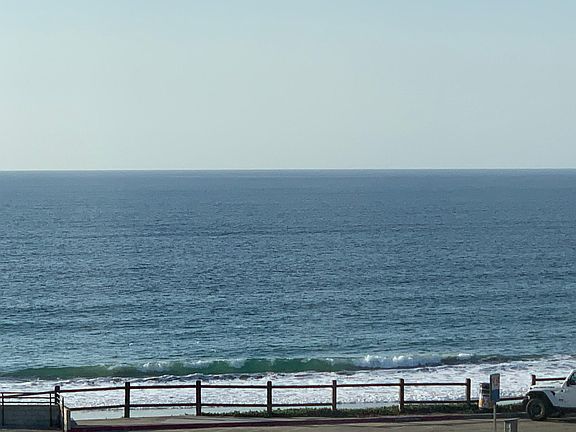 Unobstructed ocean view from the living room, dining room, kitchen and deck of your Penthouse