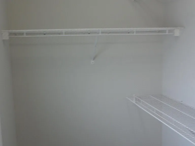 Front Master Walk-in Closet