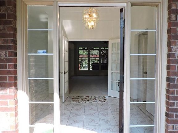 Foyer and Entrance to Great Room over looking patio/pool.