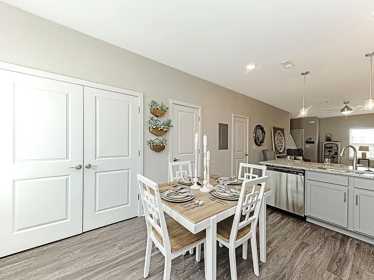 Kitchen with granite counters, stainless appliances, and modern cabinetry