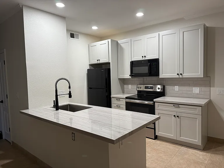 Newly updated kitchen with quartzite countertops