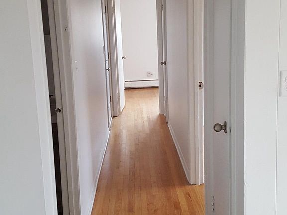 Corridor, connecting bathroom and two bedrooms