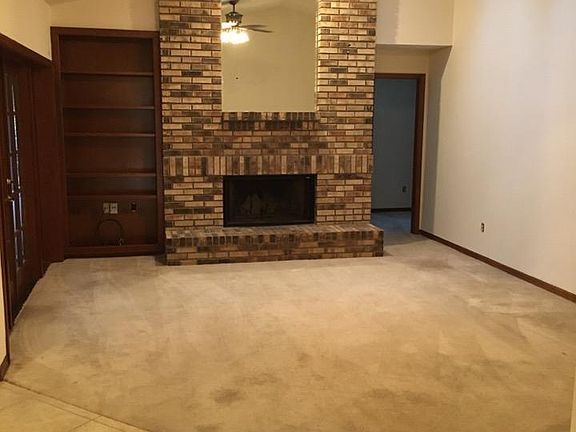 Family room, brick fireplace, vaulted ceilings