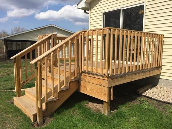 This deck is located right off the kitchen.