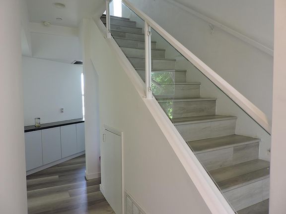 stairs from mid level to bottom floor