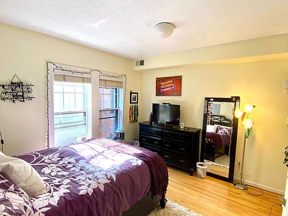 Bedroom #1, windows facing rear of building