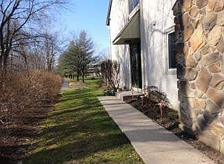 House Facing walking trail & woods