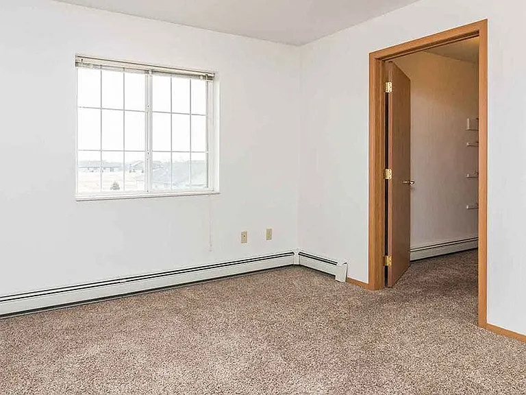 EAST WOODS APARTMENTS — Photo 7