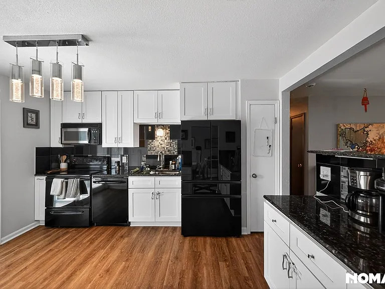 6913 Wolff St — Photo 16