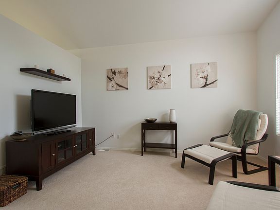 Living room with vaulted ceilings
