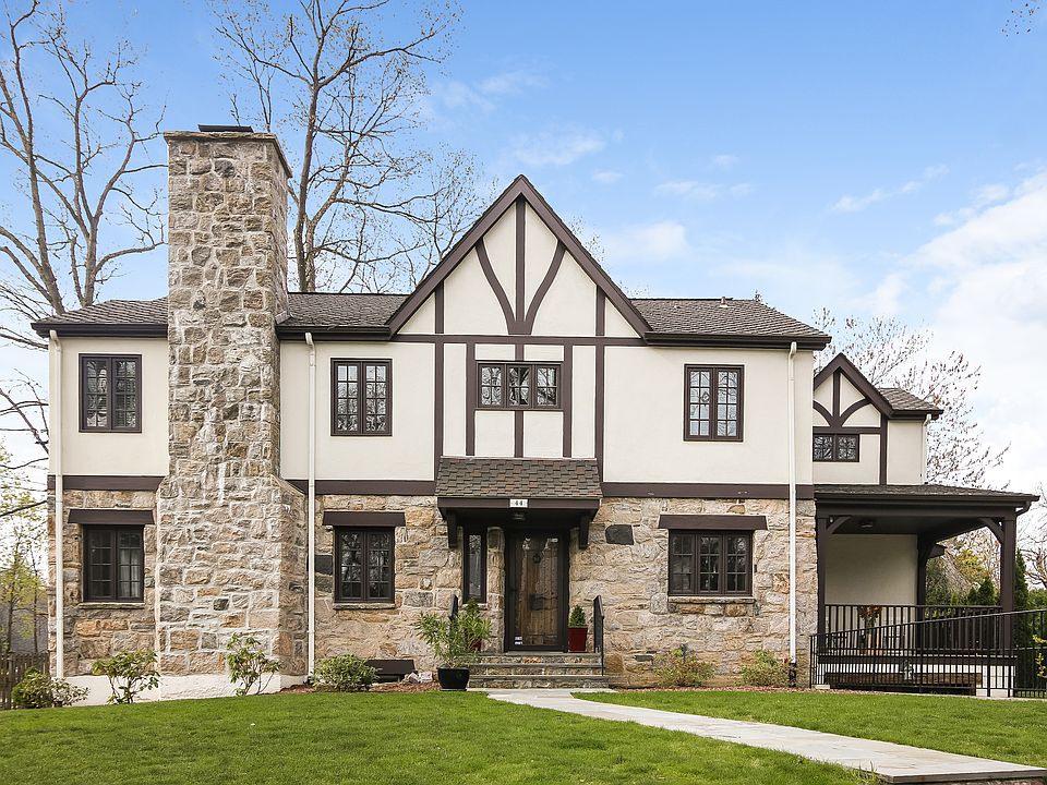 Beautifully sited on the street and the property, this home is distinctive both inside and out.