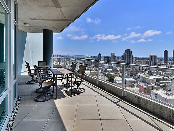 An enormous wrap-around balcony presents a prime opportunity for amazing indoor/outdoor living.