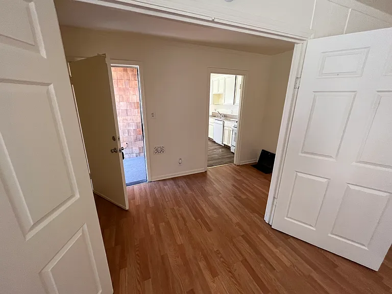 Entry, front room, through to kitchen
