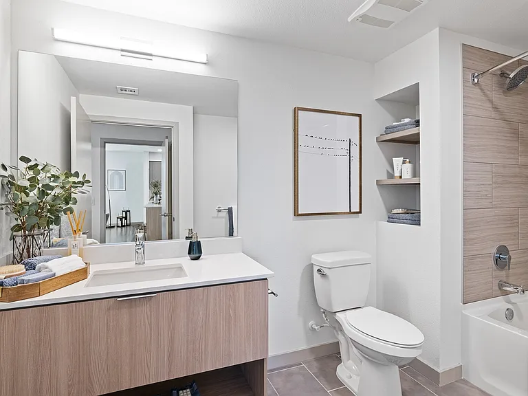 Refresh and unwind in a sleek, spa-inspired bathroom designed for both comfort and style.