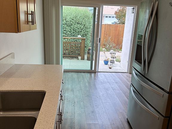 Kitchen to dining area and back patio