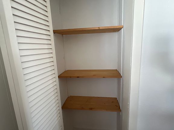 Living room storage closet shown in previous photo.