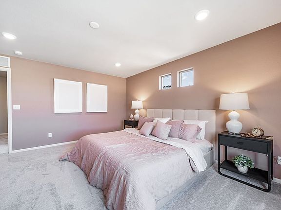 Primary bedroom of Triumph floorplan