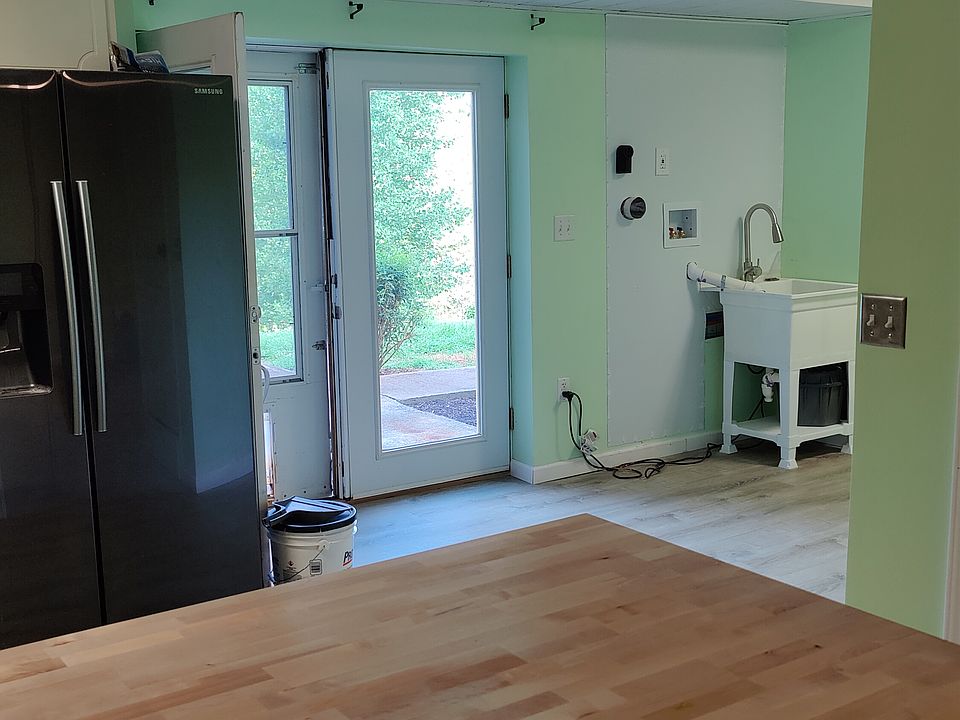 View from the Island of the entry door and Stackable laundry hookup