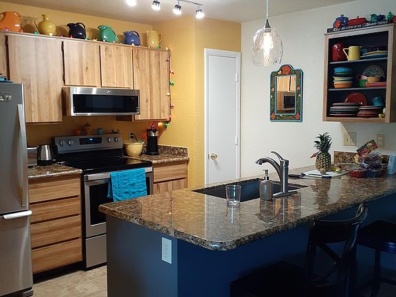 Kitchen, corner pantry, and large bar