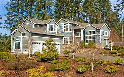 Home sits high on lot for maximum privacy.