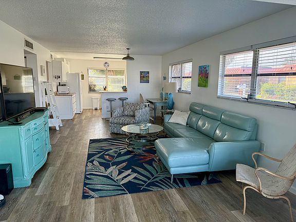 Spacious living room with plenty of natural light and a comfortable, inviting layout.