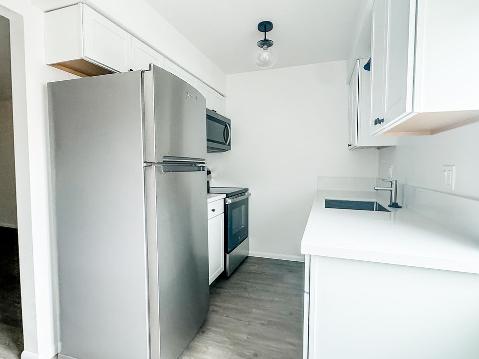 Newly finished kitchen with stainless steel appliances