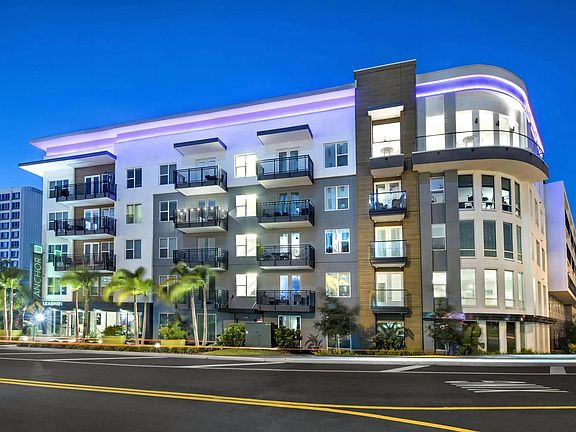 Anchor Riverwalk Apartment Exterior with Balconies and Modern Lighting