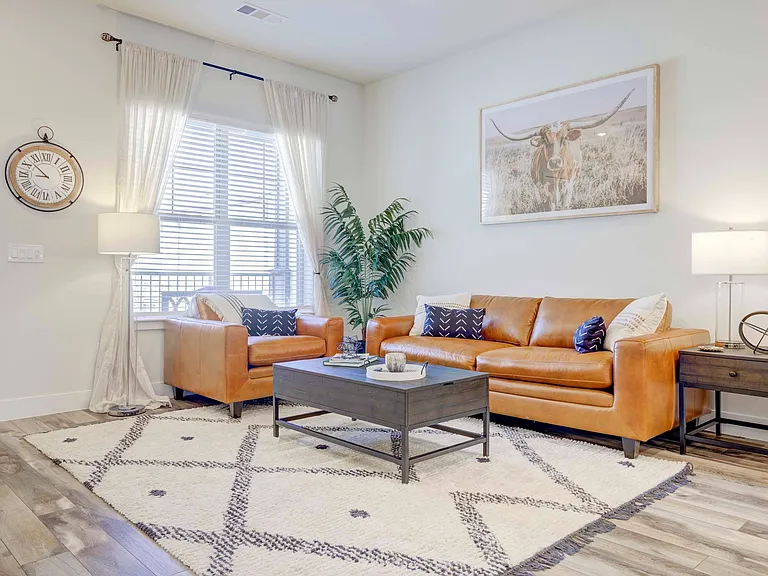 Cottage living room with wood plank flooring