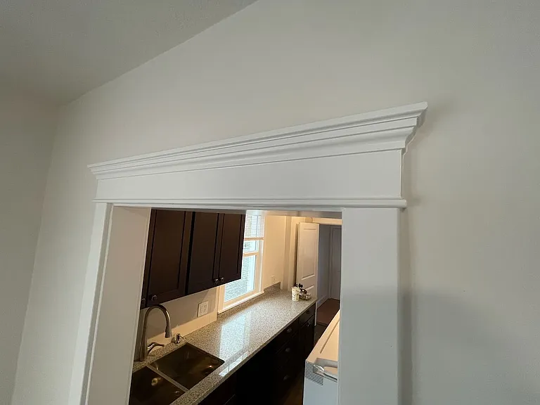Recreated moldings to match originals throughout.