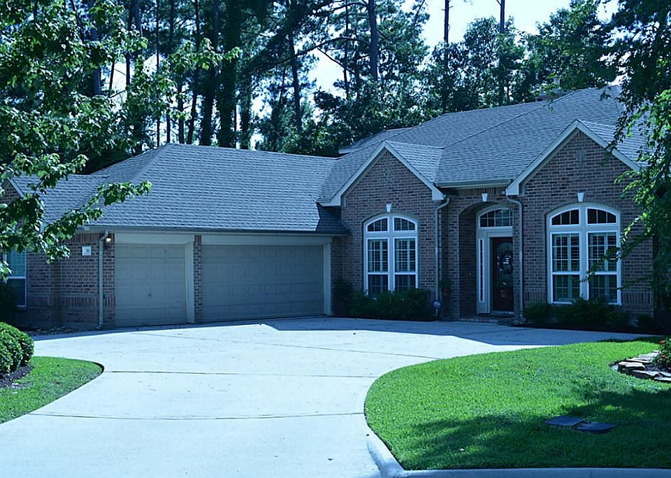 Secluded amongst the towering oak and pine trees, this 3225 sq. ft. home is a peaceful retreat with 