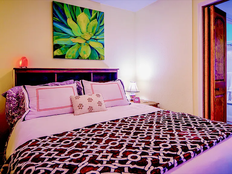 Bedroom: Queen-Size Bed, Memory Foam Mattress, High Thread Count Linens