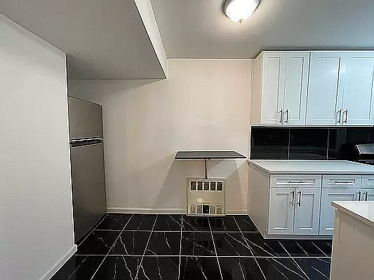 4th image of 64-48 Booth St #1D