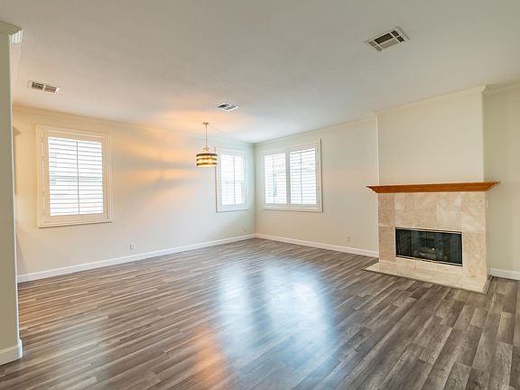Main living area with gas fireplace that turns on with a switch.
