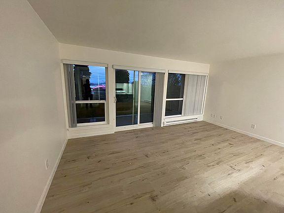 Large living area with view of Seattle downtown and the stadiums