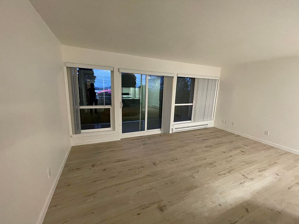 Large living area with view of Seattle downtown and the stadiums