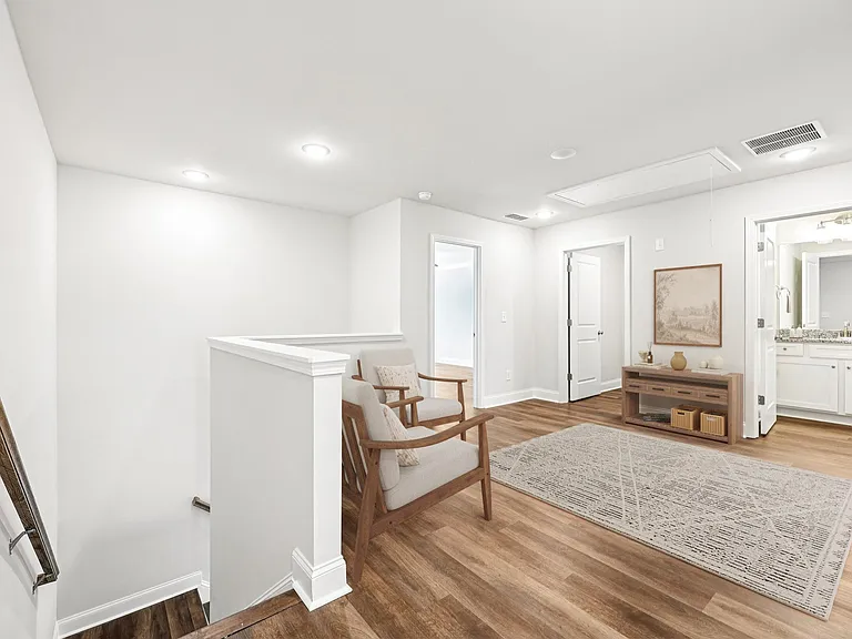 Loft area ideal for family gatherings just steps from the upstairs bedrooms.