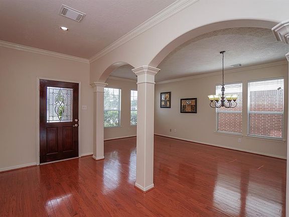 The entryway to this home is bright large and open. The flooring is in immaculate condition.
